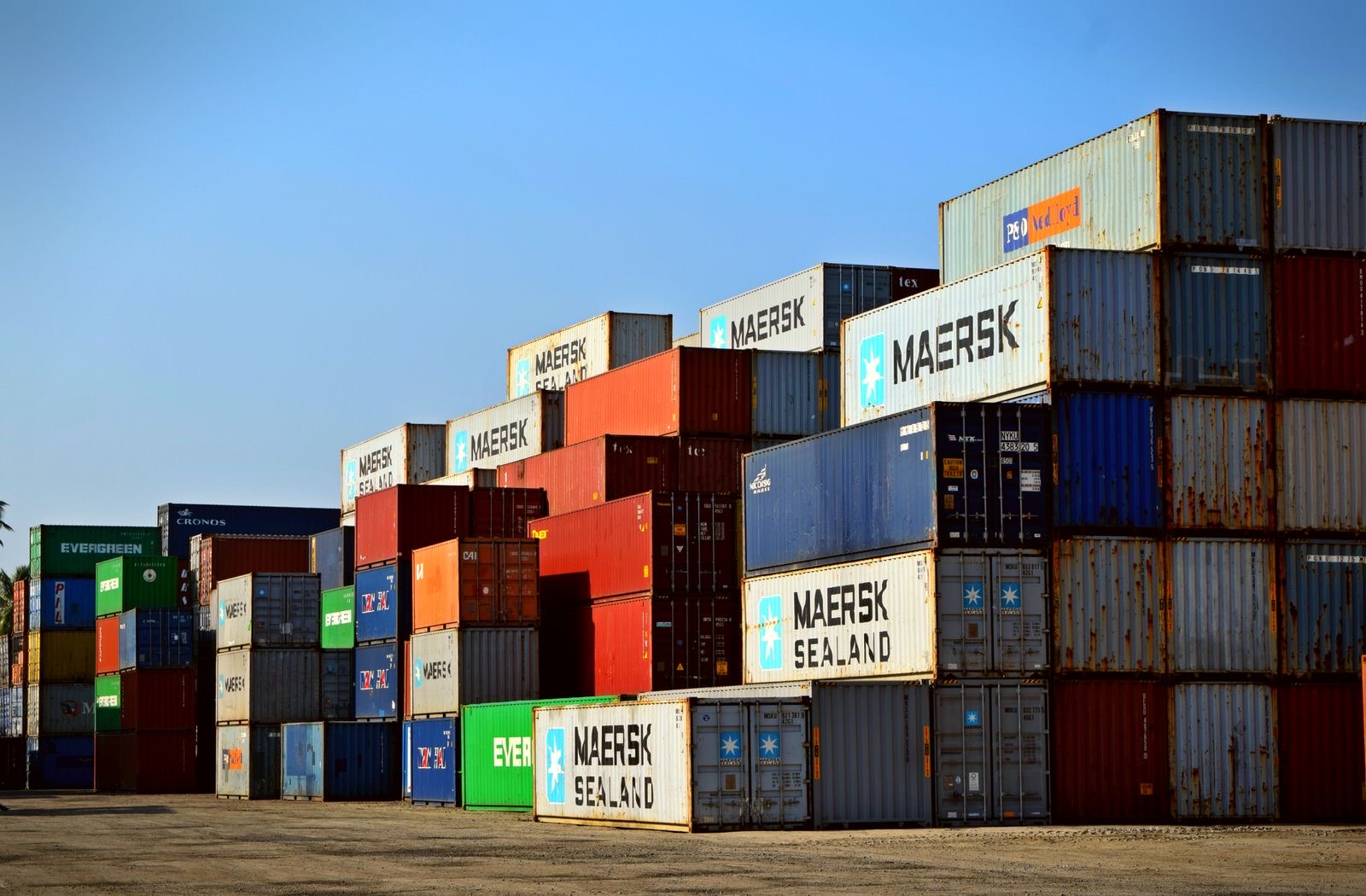 Intermodal containers stacked at a rail yard